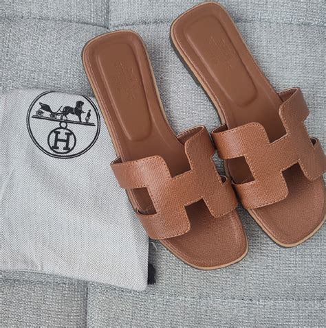 brązowe klapki hermes|Hermès Oasis klapki .